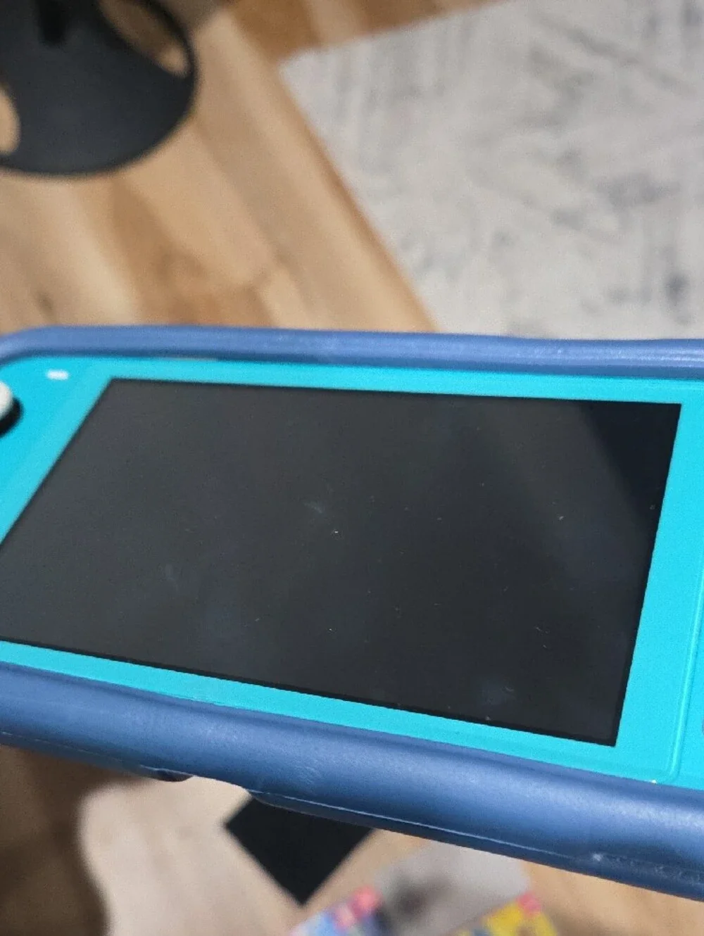 Nintendo Switch Lite Turquoise with Zelda Carry Case and Game Bundle
